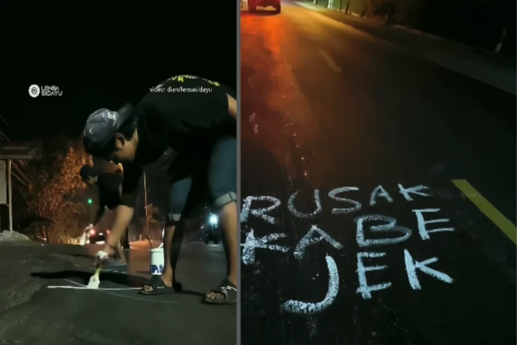 Tangkap layar video aksi sekelompok pemuda mengecat jalan raya di Gresik supaya bisa memberi tanda kerusakan jalan kepada pengendara