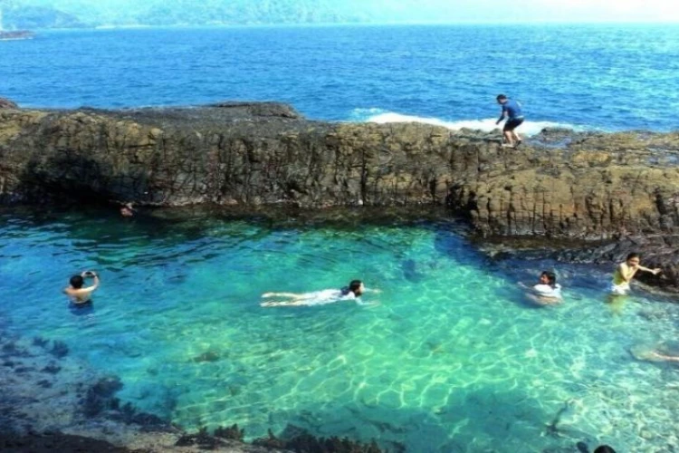 Ket Foto: Foto dari objek wisata Teluk Kiluan, Lampung (Foto/Web/disparbud.tanggamus.go.id)