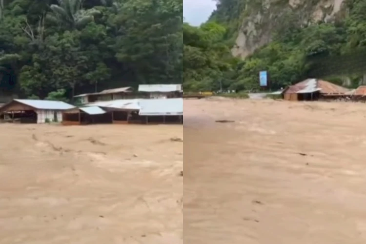 Meluapnya Sungai Ngarai Sianok di Kota Bukittinggi Sumatera Barat mengakibatkan 14 rumah alami kerusakan.