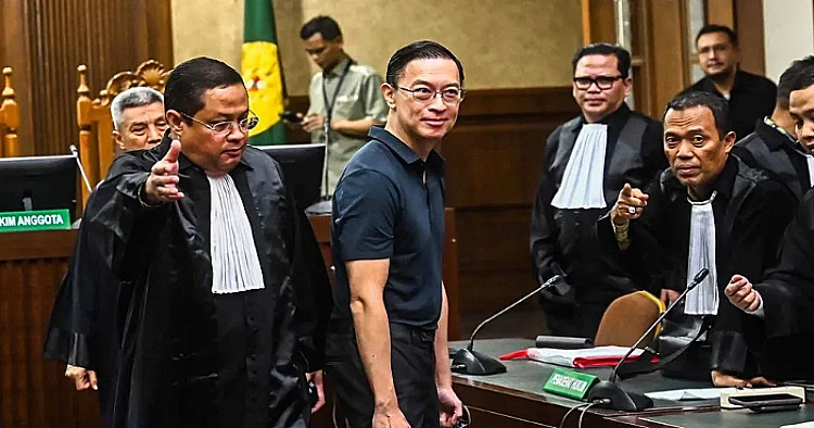 Potret Tom Lembong ketika mengikuti sidang pembacaan dakwaan dalam kasus dugaan korupsi impor gula