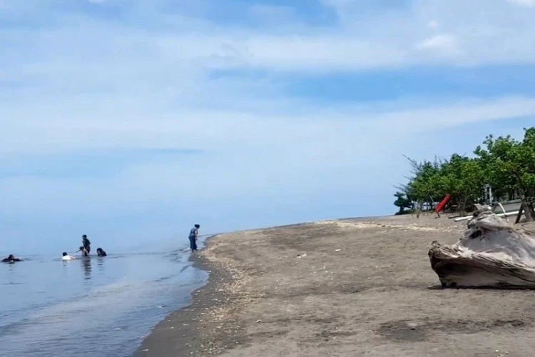Ket Foto: Foto dari objek wisata Lombok, Pantai Impos (Foto/Youtube/Yanta PS)