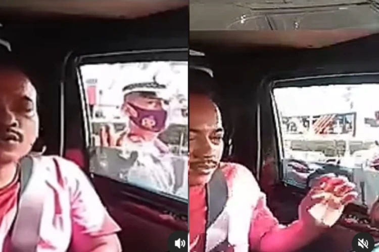 Video viral menunjukkan oknum polisi meminta uang Rp50 ribu dari sopir. Polda Metro Jaya minta maaf.