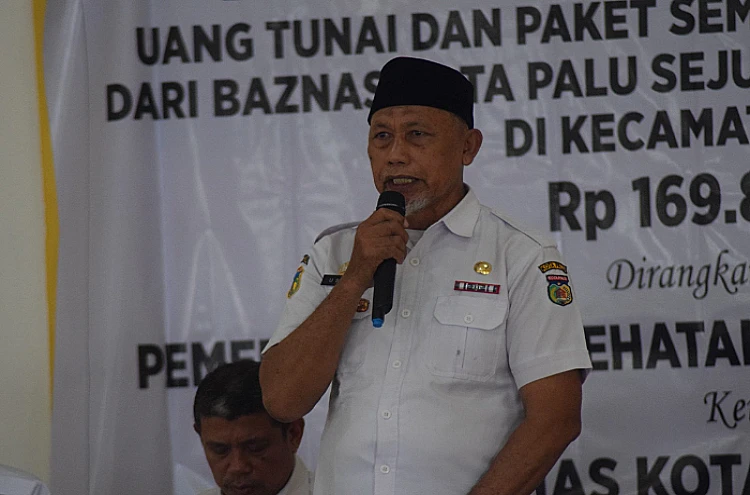 Ket. Foto: 306 Mustahik Menerima Bantuan ZIS yang Disalurkan oleh Baznas dan Pemkot Palu