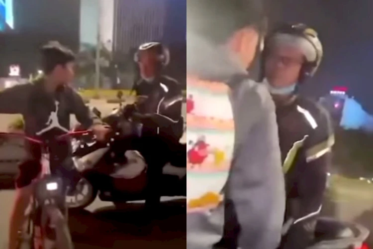 Seorang driver ojek online (ojol) emosi dan terlibat perkelahian dengan seorang bocah pesepeda di jalur khusus sepeda.