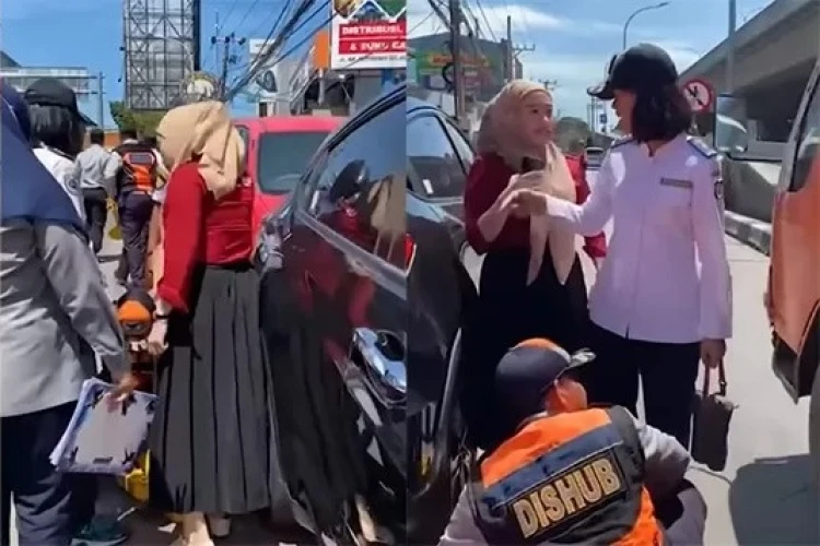 Wanita ini marah-marah ke petugas Dishub Makassar yang gembok mobilnya gegara parkir sembaarangan di bahu jalan.