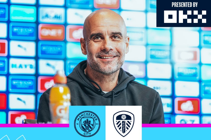 <p>Ket Foto: Foto Pelatih Manchester City, Pep Guardiola sedang konferensi Pers jelang laga lawan Leeds (Foto/Twitter/Manchester City)</p>
