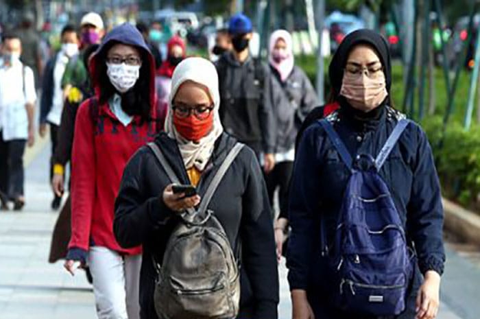 <p>Foto: Illustrasi hidup bersama covid19.</p>

