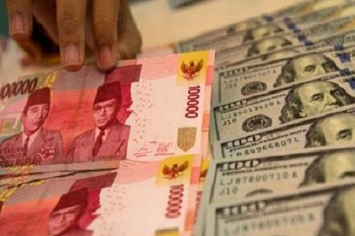<p>Foto: Illustrasi perdagangan spot rupiah.</p>
