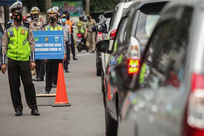 <p>Foto: Illustrasi penegakan disiplin protokol kesehatan TNI-Polri 2020.</p>
