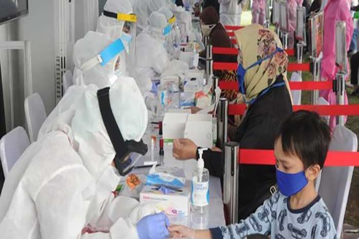 <p>Foto: Illustrasi uji pcr covid 19 pada anak.</p>
