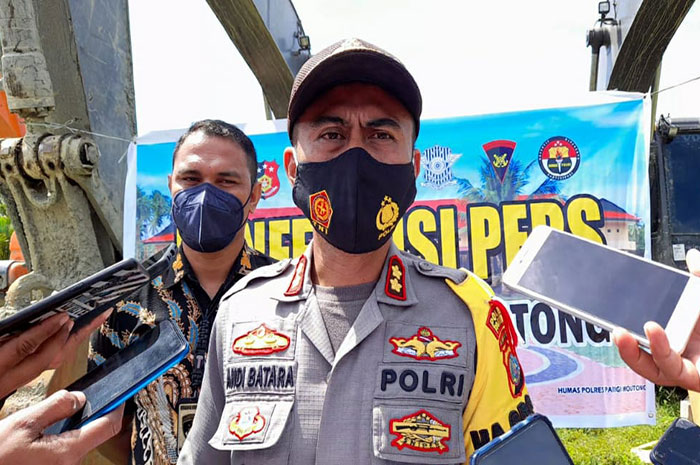 <p>Foto: Kapolres Parimo, Sulteng, Andi Batara Purwacaraka, saat press con terkait kasus tambang Buranga, di Mako Polres Parimo, Jumat 12 Maret 2021.</p>
