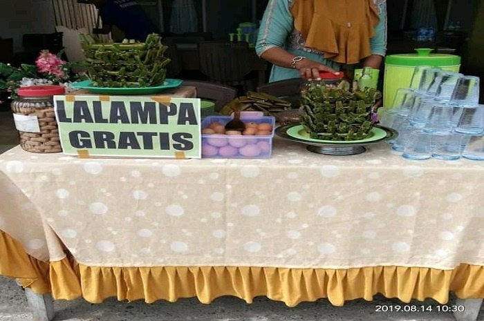 <p>Ajang Wisata Kuliner, Parimo Gelar Makan Lalampa Gratis</p>
