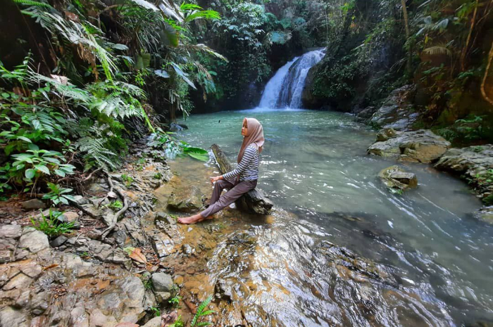 <p>Ket foto: Potret cantik wisata Air Terjun Koboko yang ada di Riau (Foto/Instagram/lesynaga)</p>

