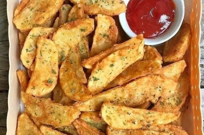 <p>Keterangan Foto : Potato wedges camilan lezat yang mudah untuk dibuat, (Foto/Instagram/@cynthiahali)</p>
