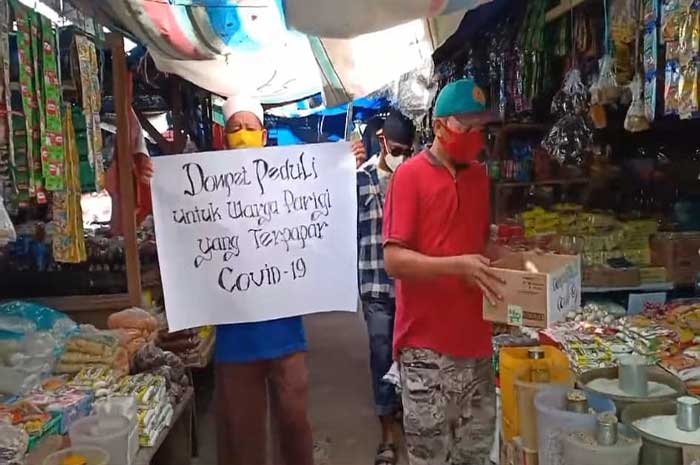 <p>Foto: Relawan Kemanusiaan Galang Dana Untuk Warga Positif Covid 19 di Parigi Moutong, Sabtu 26 Desember 2020.</p>
