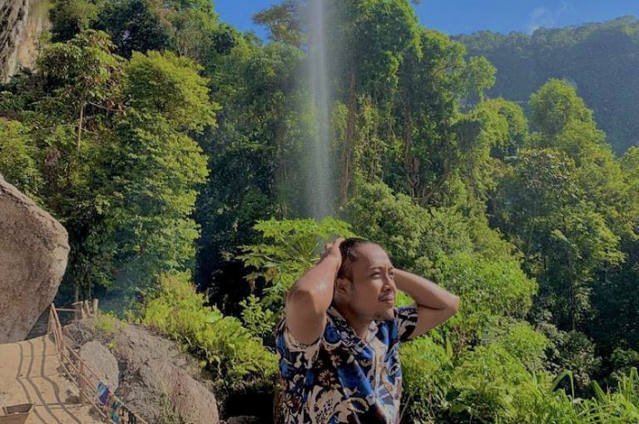 <p>Ket foto: Menikmati kemegahan wisata Air Terjun Batu Tilam di Kampar Riau (Foto/Instagram/joniijong)</p>
