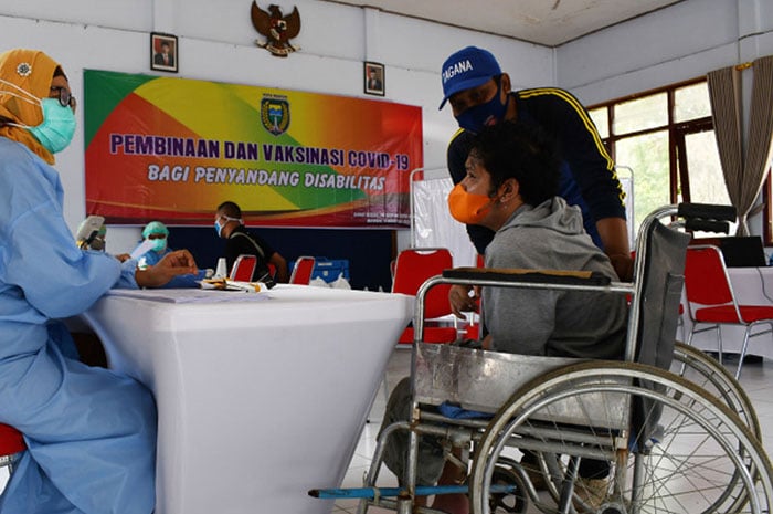 <p>Foto: Illustrasi vaksinasi penyandang disabilitas.</p>
