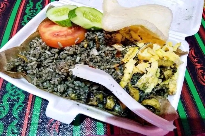 <p>Keterangan Foto : Nasi goreng cumi yang mudah untuk dimasak, (Foto/Instagram/@koh_aming)</p>
